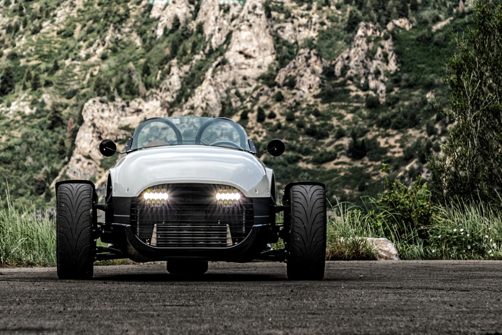 Vanderhall Venice head on with headlights lit